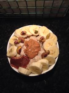 This was a good one! Friday morning oats, complete with an aesthetic flair! Gingerbread cookie oats (recipe needs some refining but watch out for it!) topped with a peanut butter cup, a banana, some pistachios, and some Trader Joe's List Flax and Chia Peanut Butter!